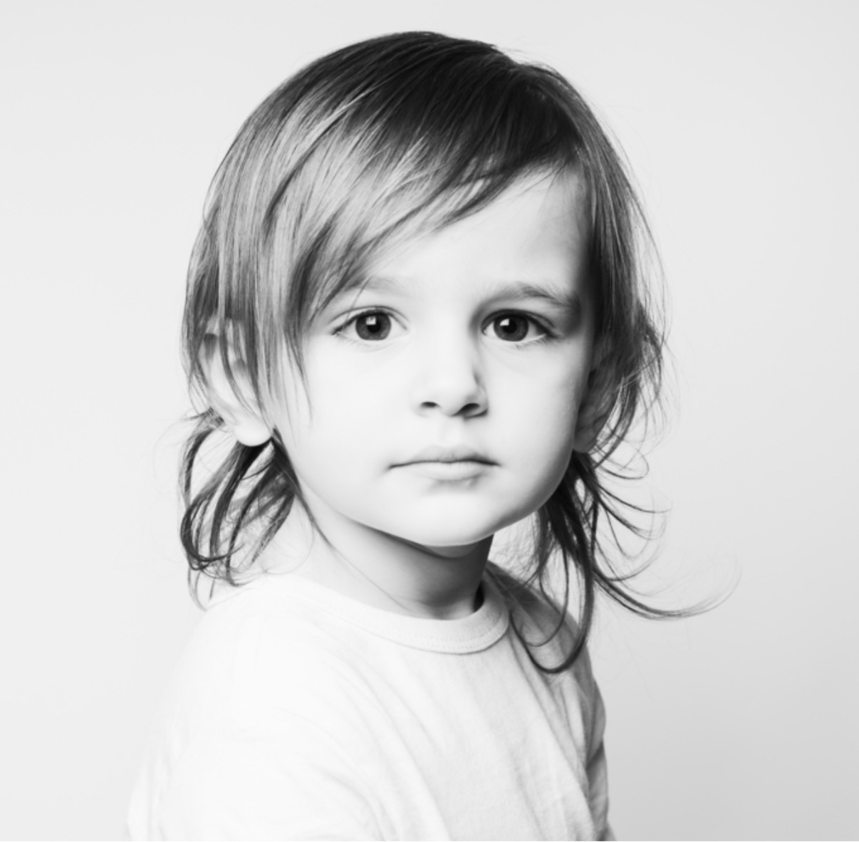 Black-and-white portrait, boy A, serious
