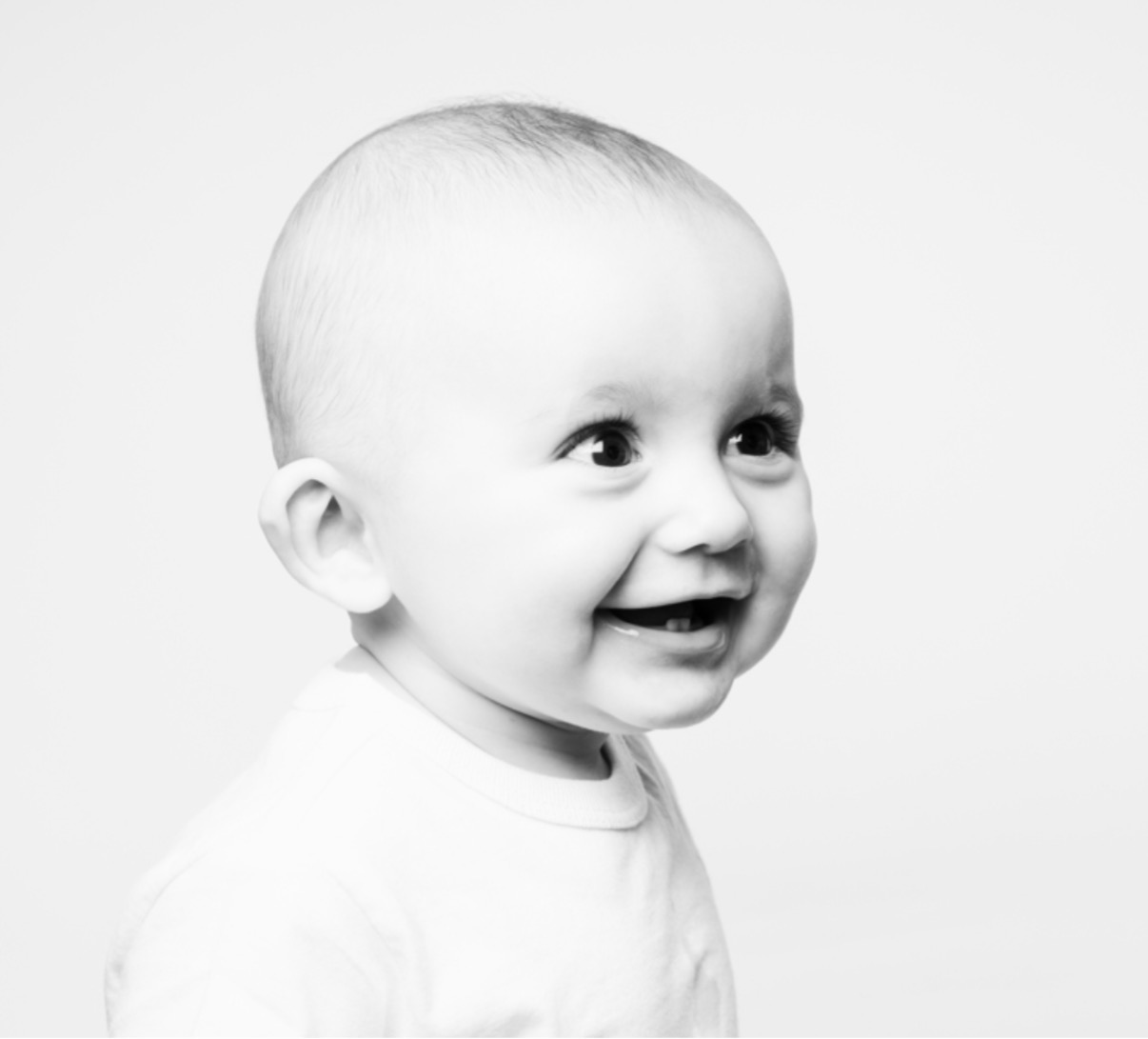 Black-and-white portrait, boy B, laughing